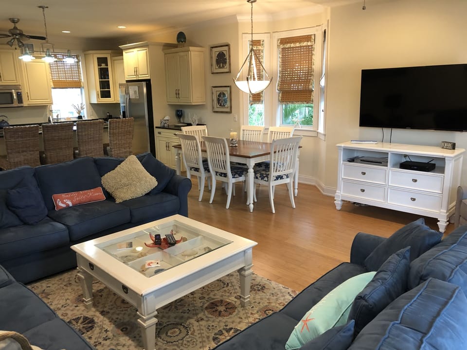 Family time is great to watch TV on one of 4 LG televisions in Salty Dogs.