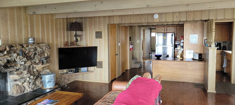 The gathering room connects to the kitchen.