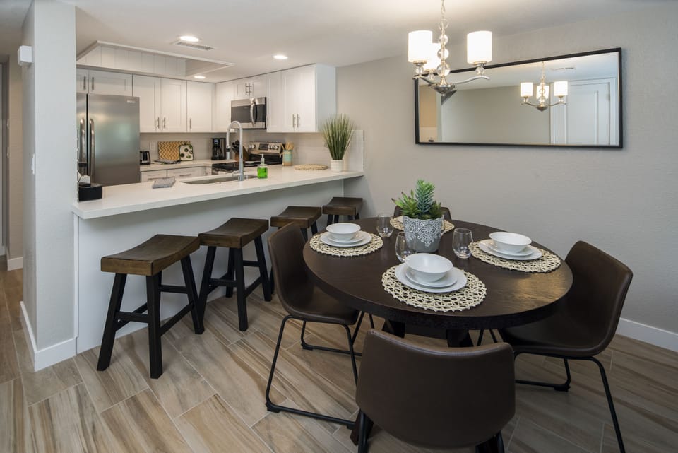 Beautiful kitchen and dining room with breakfast bar.