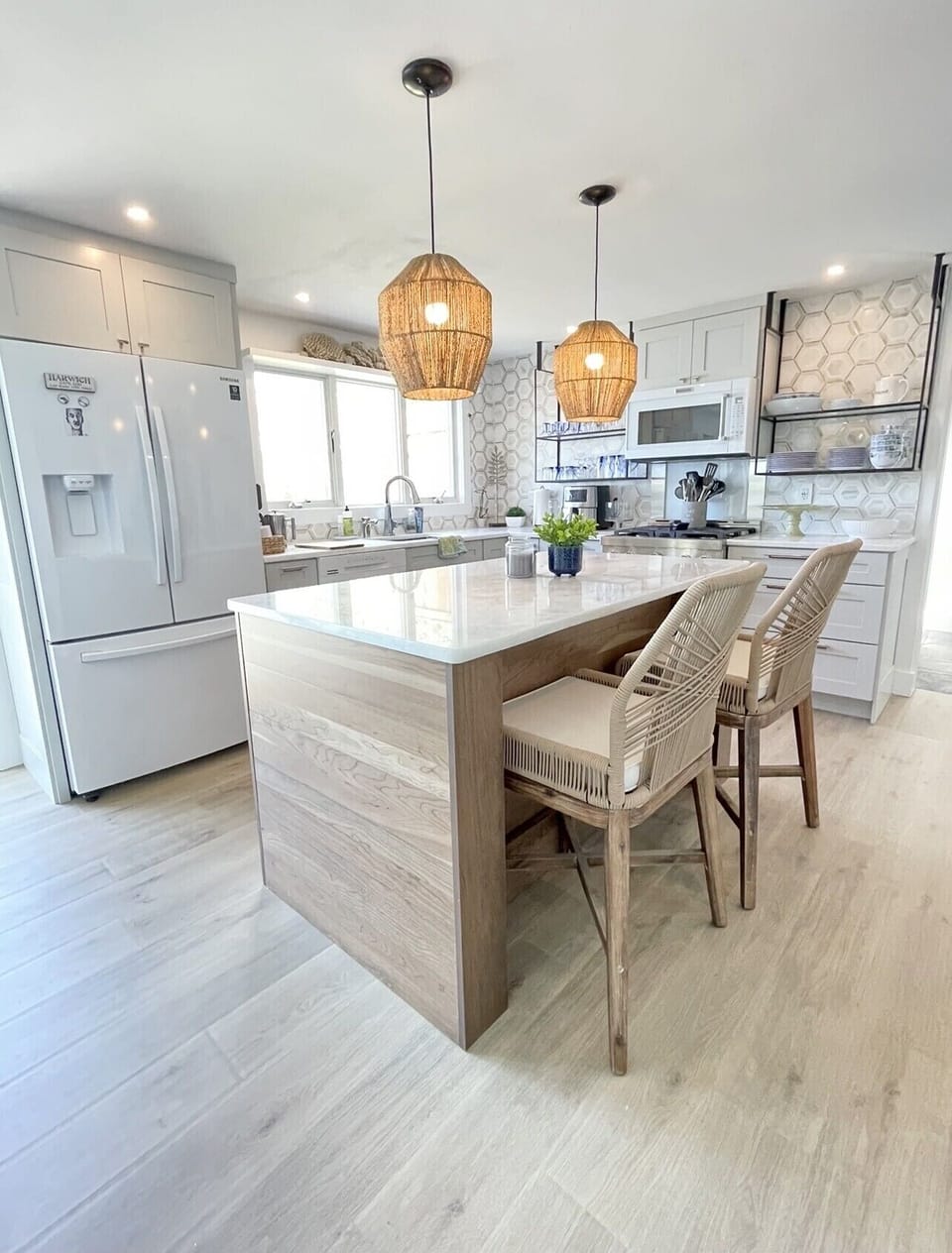 Marble counters, KitchenAid appliances & gas stove. All overlooking the water. 