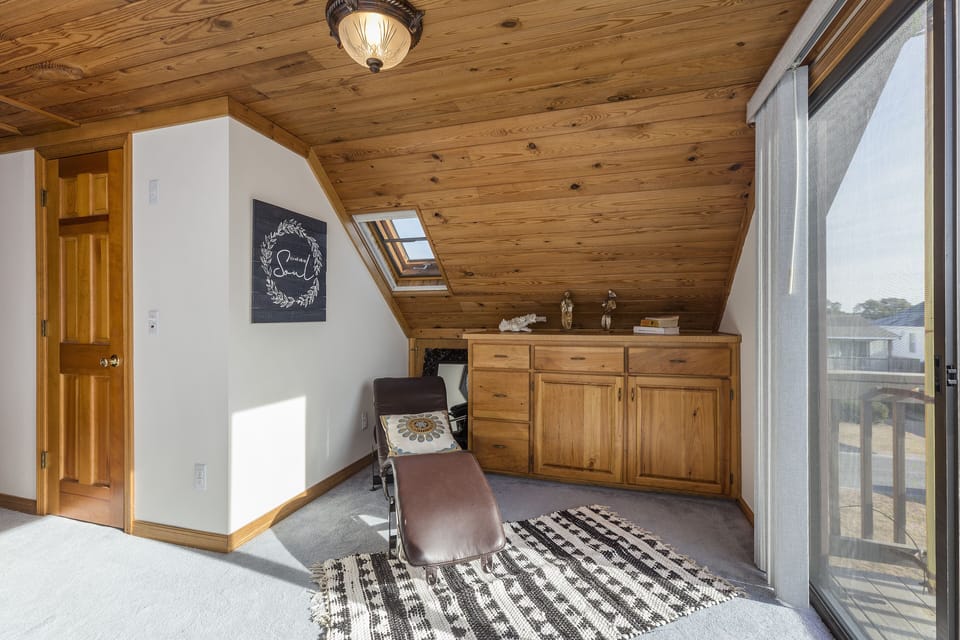 Gorgeous Sitting Area in Master is a great place to curl up with a good book.