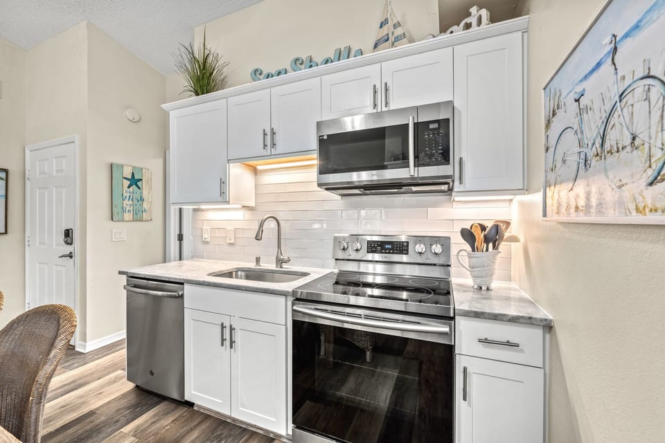 Clean countertops, a gleaming range, and every tool you need—cooking here feels less like a chore and more like part of the island experience.