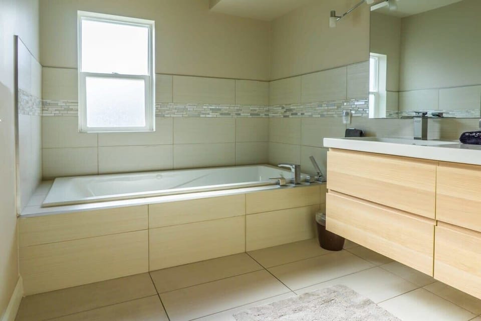 The Master bedroom offers direct access to the bathroom.