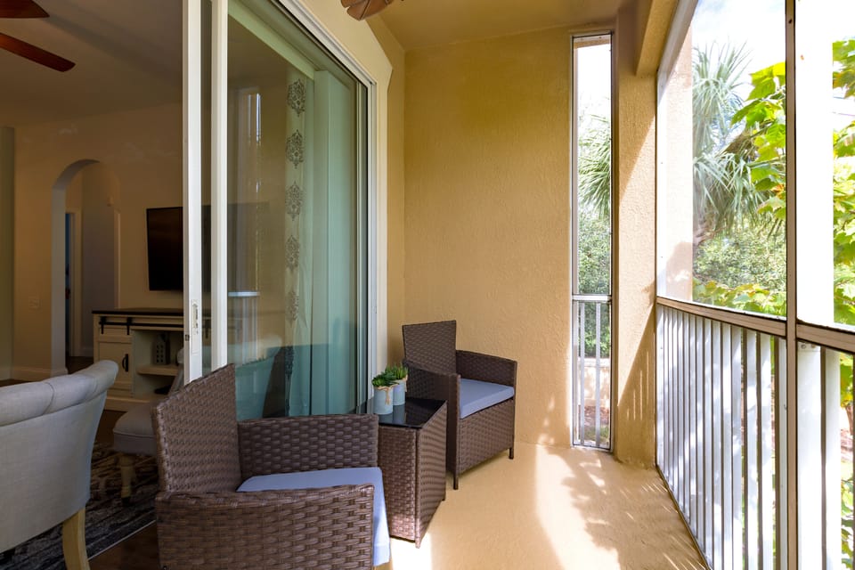 Screened in Patio with comfortable seating -  just off the living area.