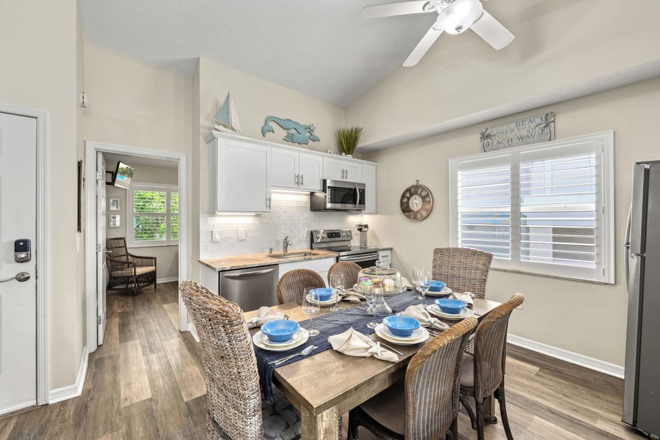 From the wide-open kitchen to the welcoming dining table, this breezy space invites slow mornings with fresh coffee.