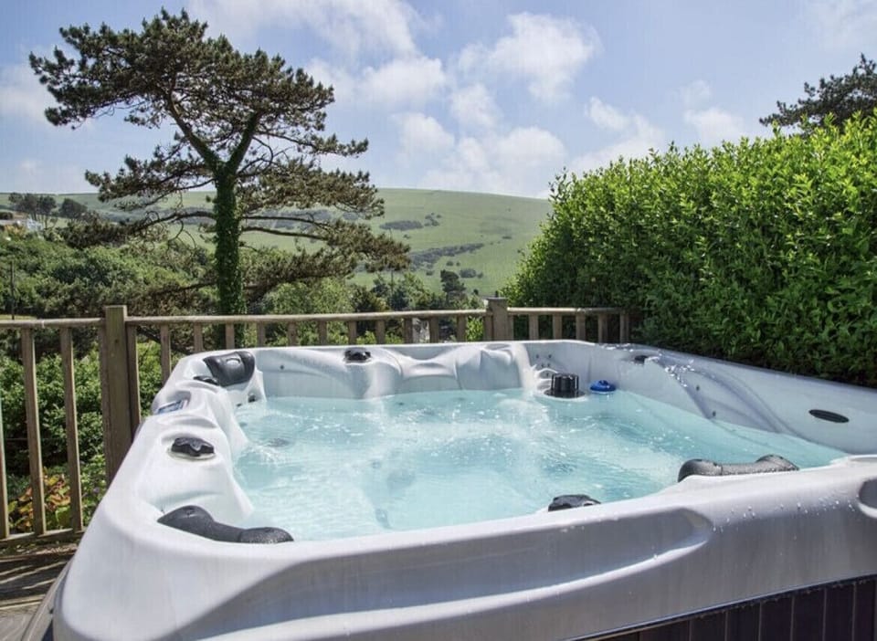Enjoy the views whilst relaxing in the 8 person hot tub on the terrace