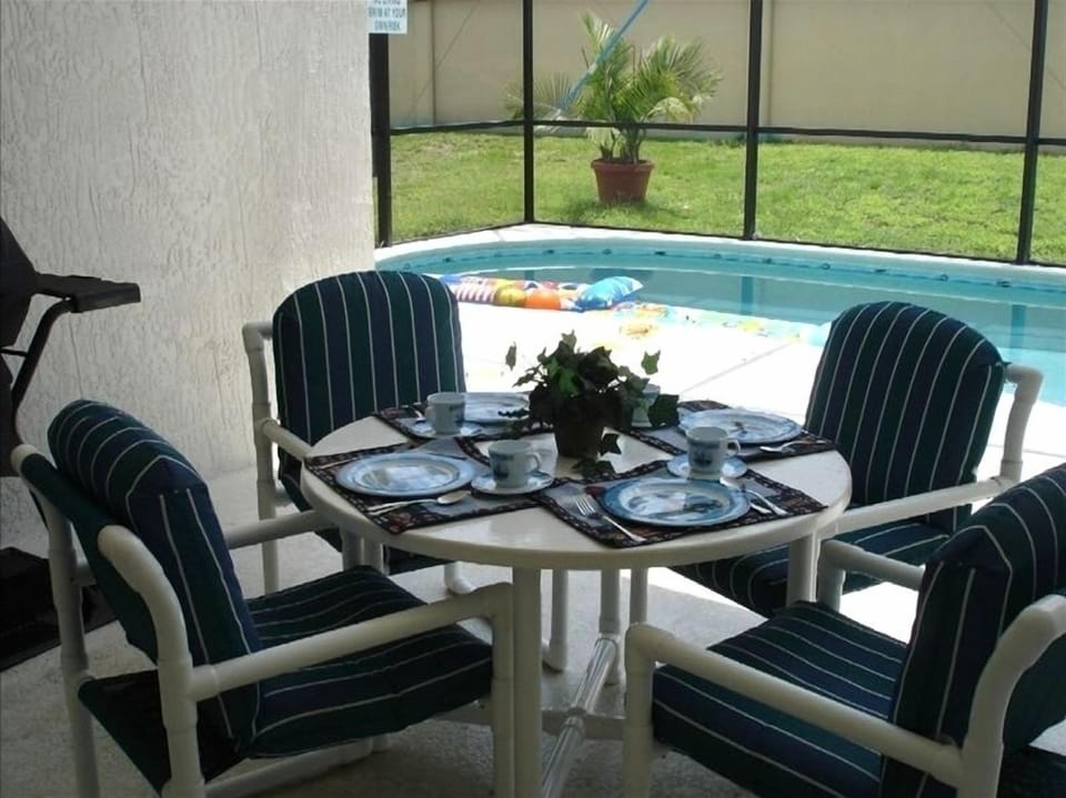 Eat by the pool while enjoying the marvelous Florida sunsets.