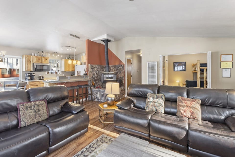 Plenty of space to relax and enjoy the crackling fire of the wood stove