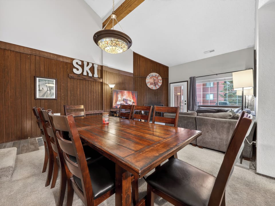 Gather around your rustic dining table for memorable meals, while the fireplace crackles warmly in the background.