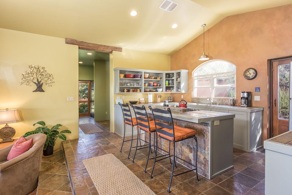 Spacious well equiped kitchen with ALL your culinary needs.  Good sharp knives.