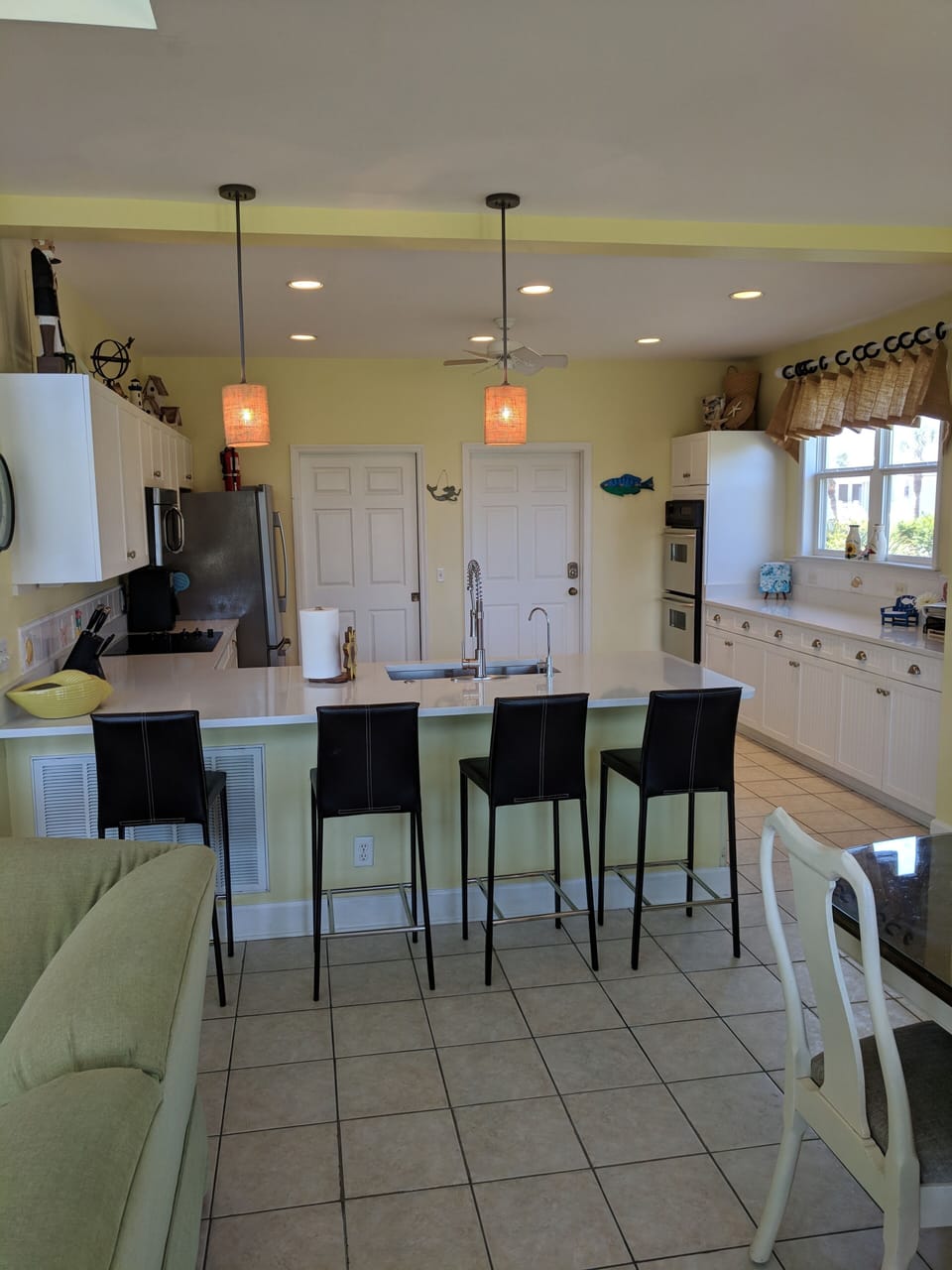 Cooks love our bright, well-equipped kitchen w/  Quartz counters & extra seating
