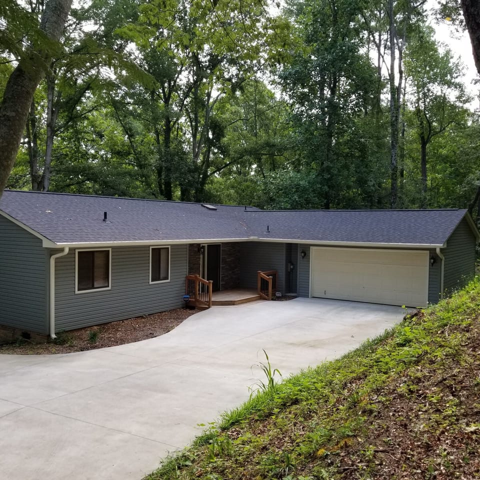 Back of house w/parking for min of 6 vehicles.  We have had 2 boats w/trailers.