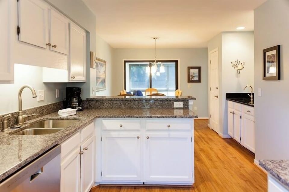 - Cook up your favorites in a bright, fully equipped kitchen with granite counters - Chat with friends at the bar while dinner simmers just steps from the table - Enjoy a warm, inviting layout perfect for family meals or evening wine chats