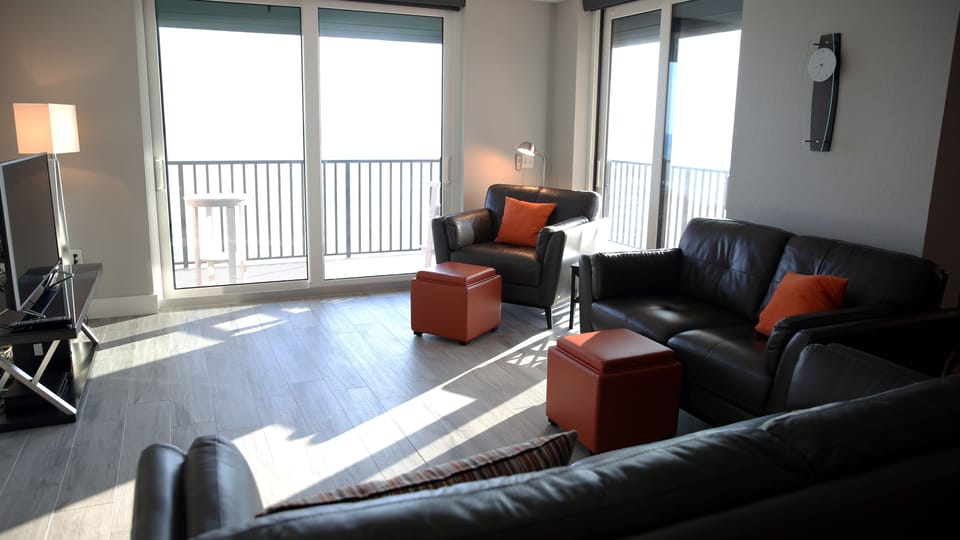 Main living area with west and north views of the gulf and beach