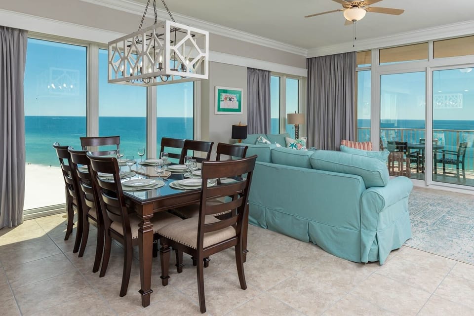 Gather around the dining table, where you can enjoy laughter and share stories amidst panoramic coastal views