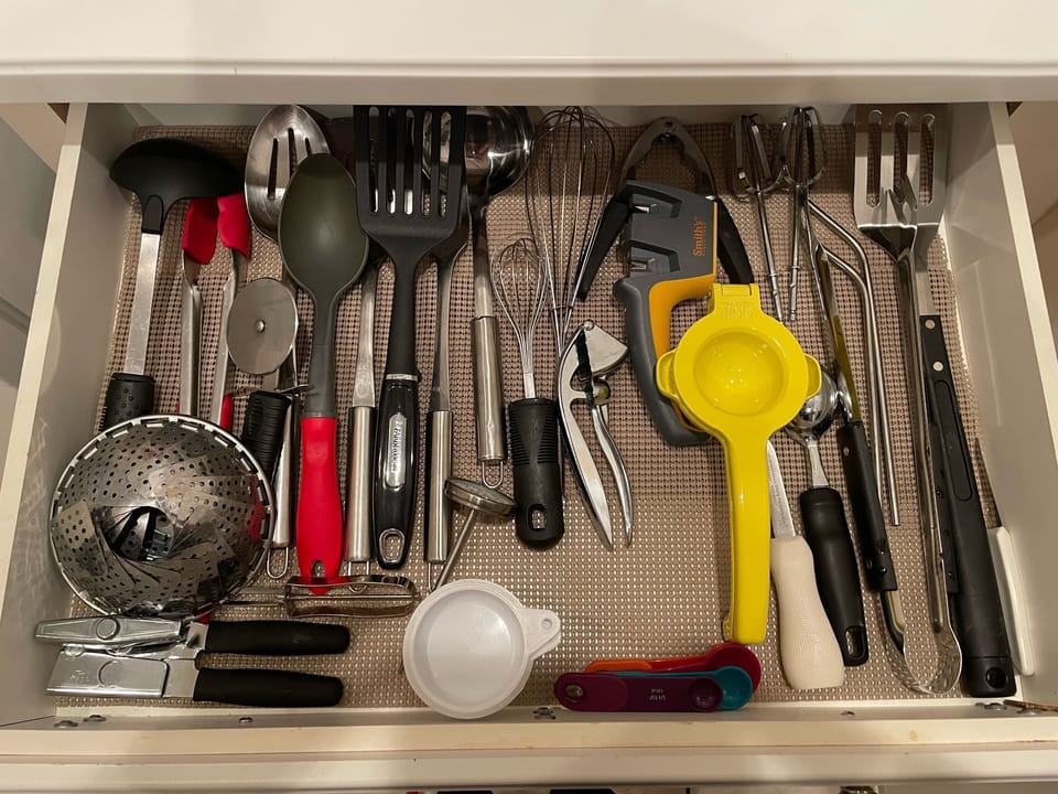Well stocked kitchen utensil drawer