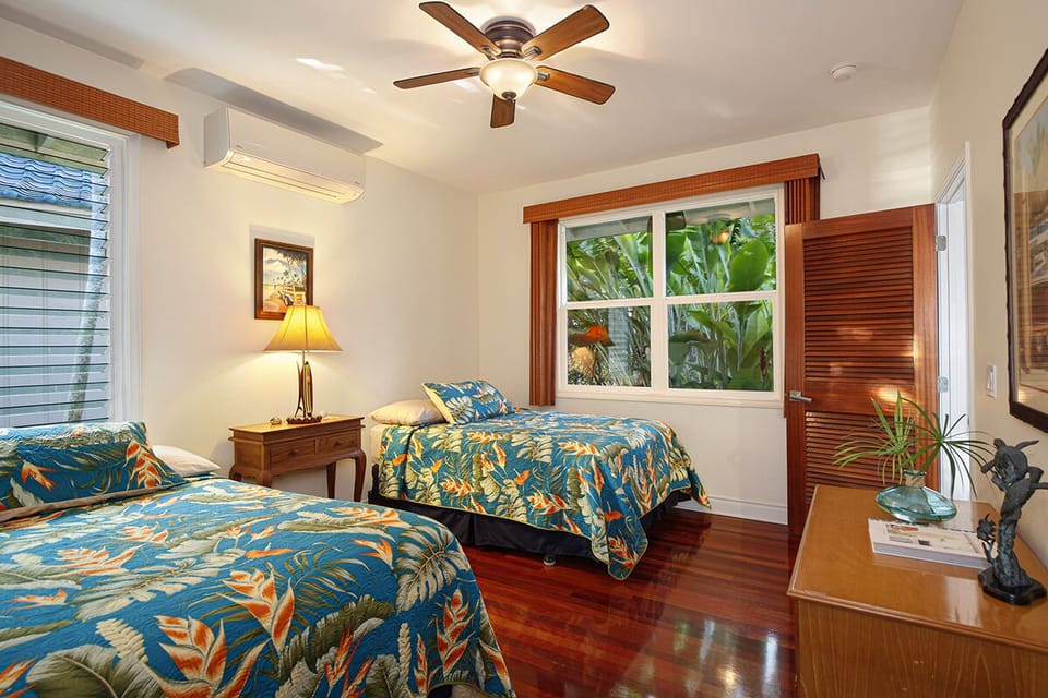 DOWNSTAIRS GUEST BEDROOM. TWO FULLS. GARDEN VIEW.