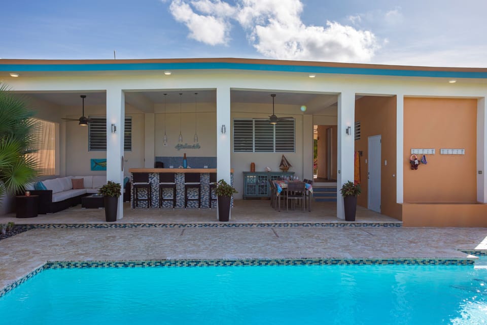 Outdoor covered patio with ceiling fans