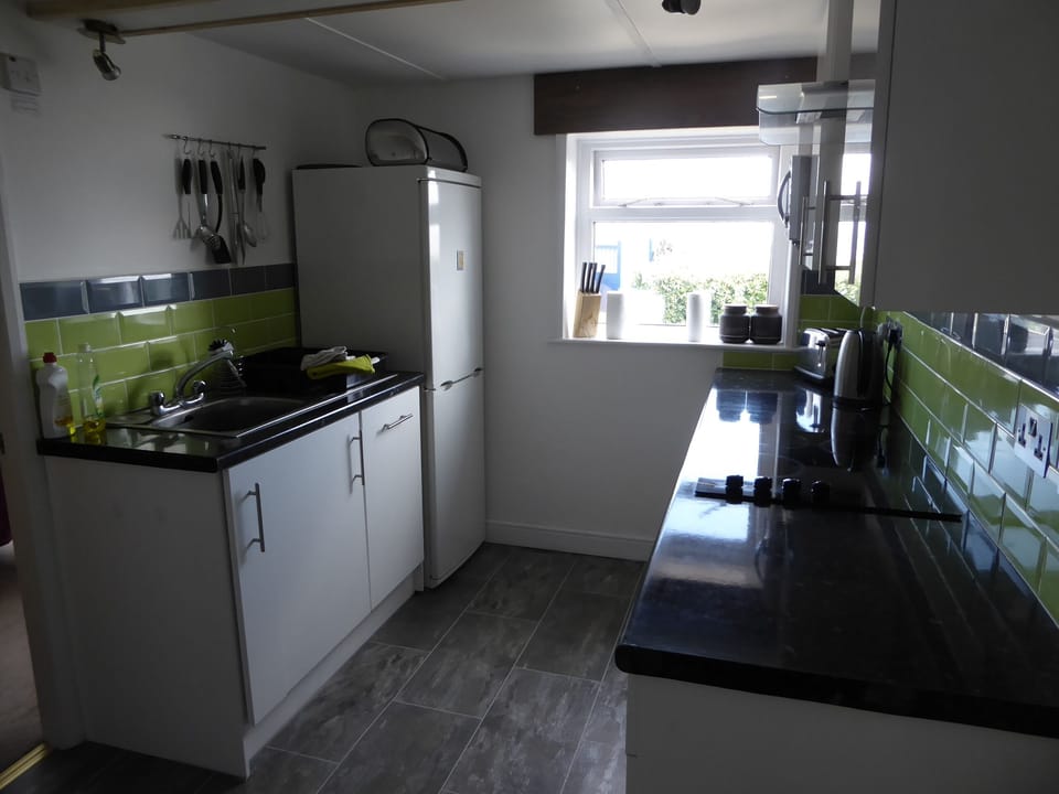 the other side of the kitchen - sorry it's so dark!