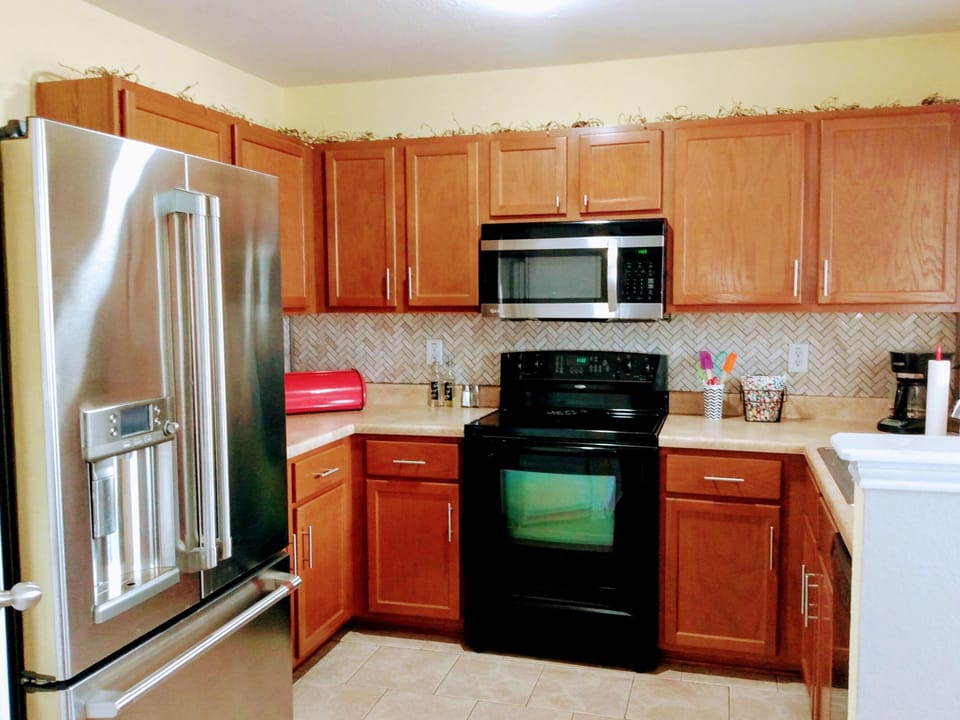 Fully stocked kitchen with basic supplies. 
