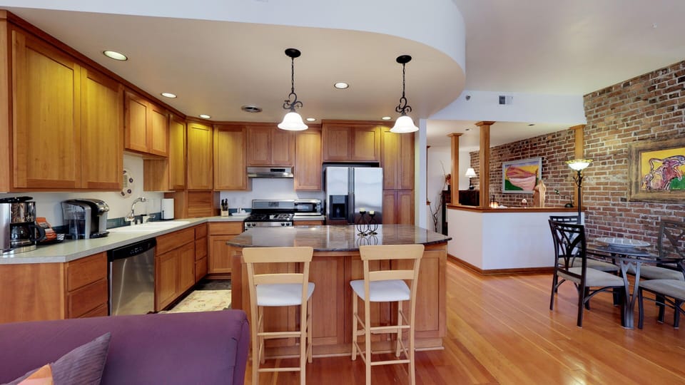 Spacious kitchen, living room and dining room.