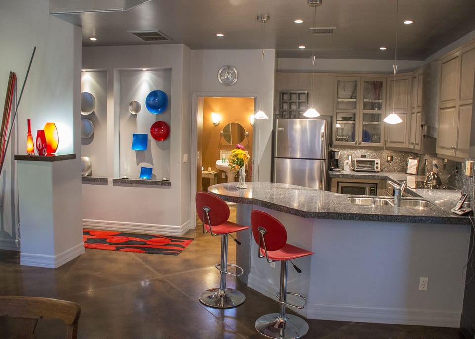 original Asian art and glass surround you as you  are preparing your meal