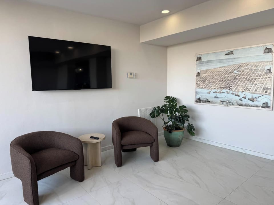 Sitting area in the coffee lounge area at By The Sea Condominiums