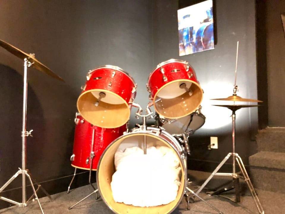 Music corner with drum set, perfect for creative and energetic moments.