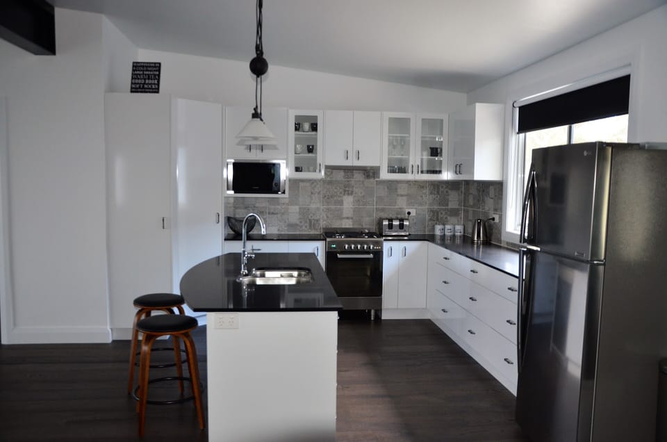 The kitchen is fully equipped with everything you need. 