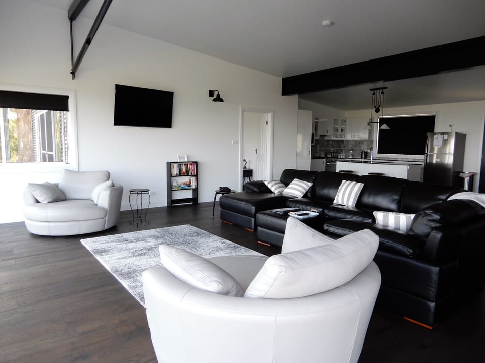 Leather lounge and snuggle chairs. You provide the wine. 