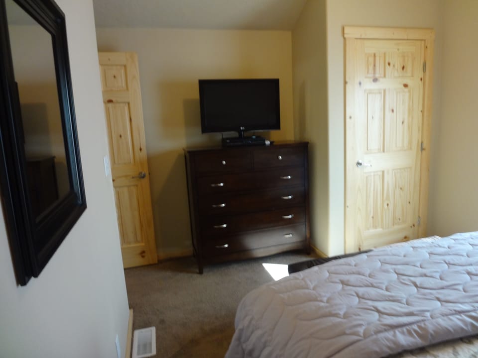 bedroom 1 has a 32" flat screen tv with direct tv service