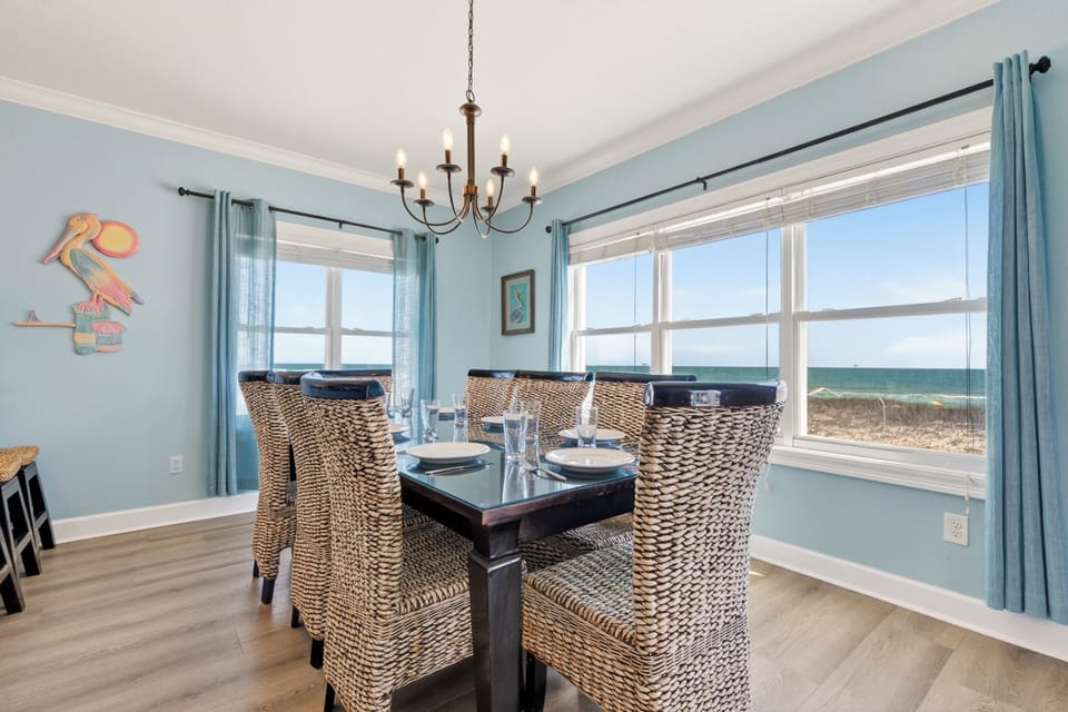 Mahogany dining table seats 8. Watch  dolphins swim in the  Gulf while you dine