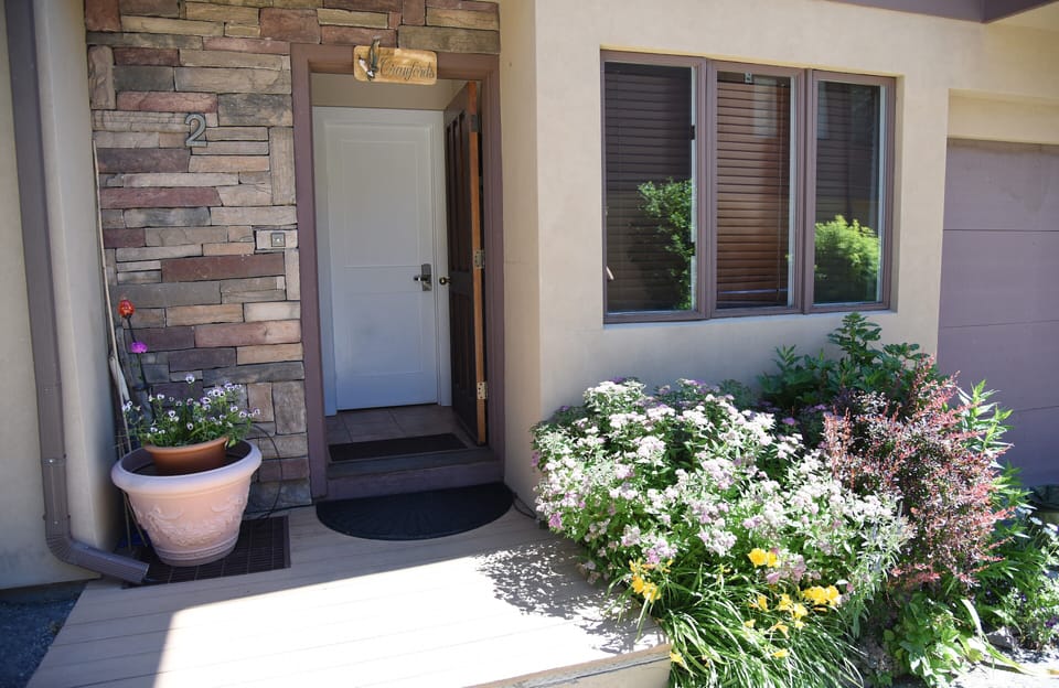 The inside entrance into the studio, through the white door