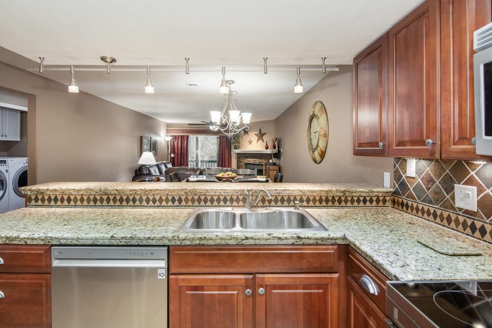 Kitchen is open to living area so it's easy to interact with family