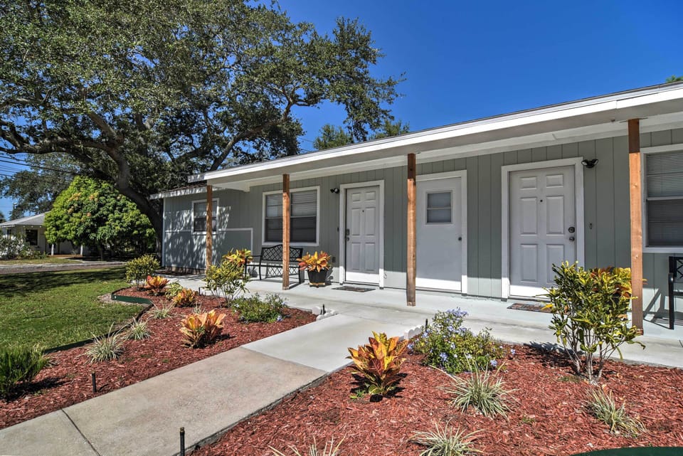 Charming landscaping adorns the front yard of the property.