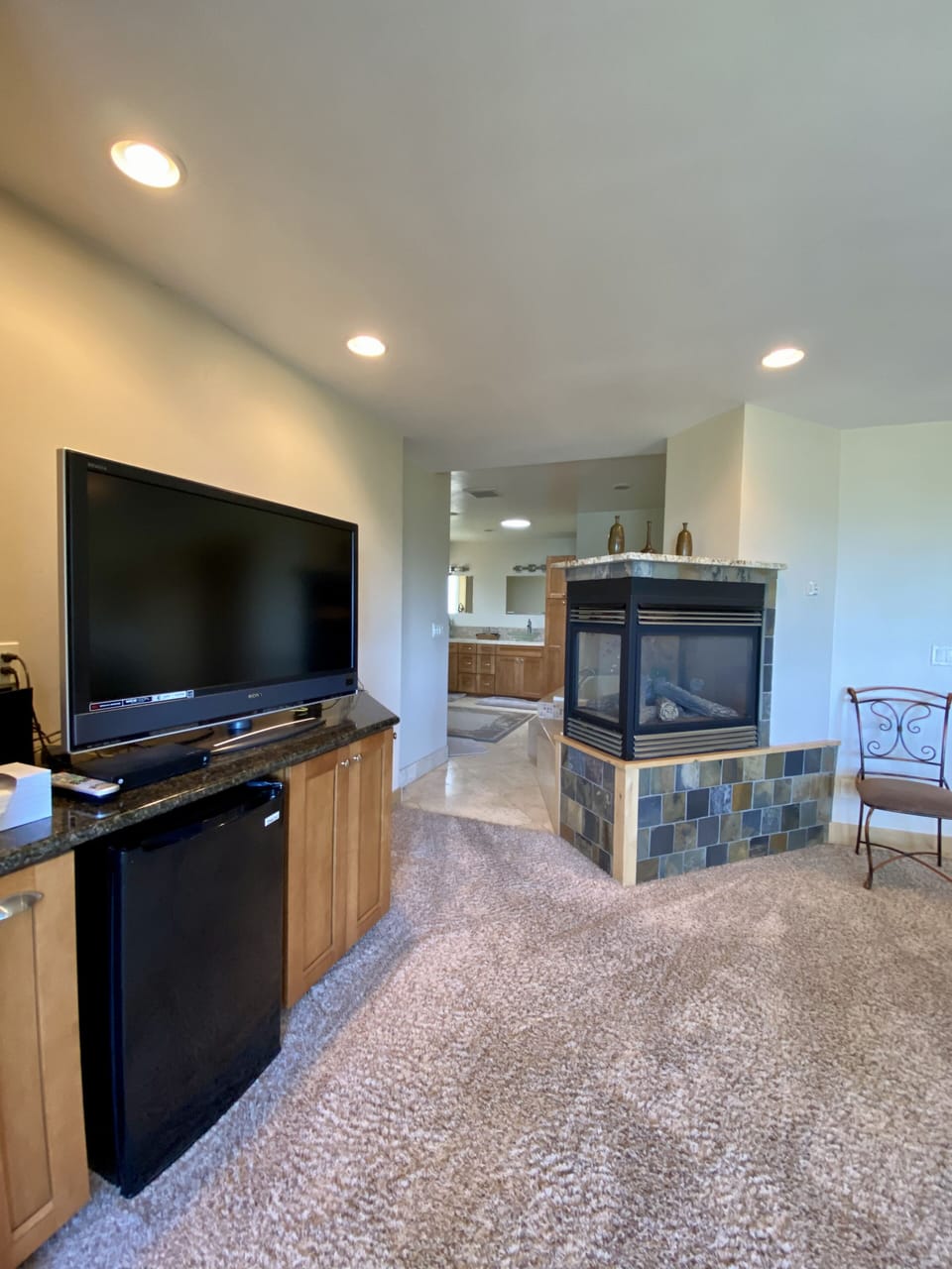 Master Bedroom. Enjoy the large tv and fireplace.