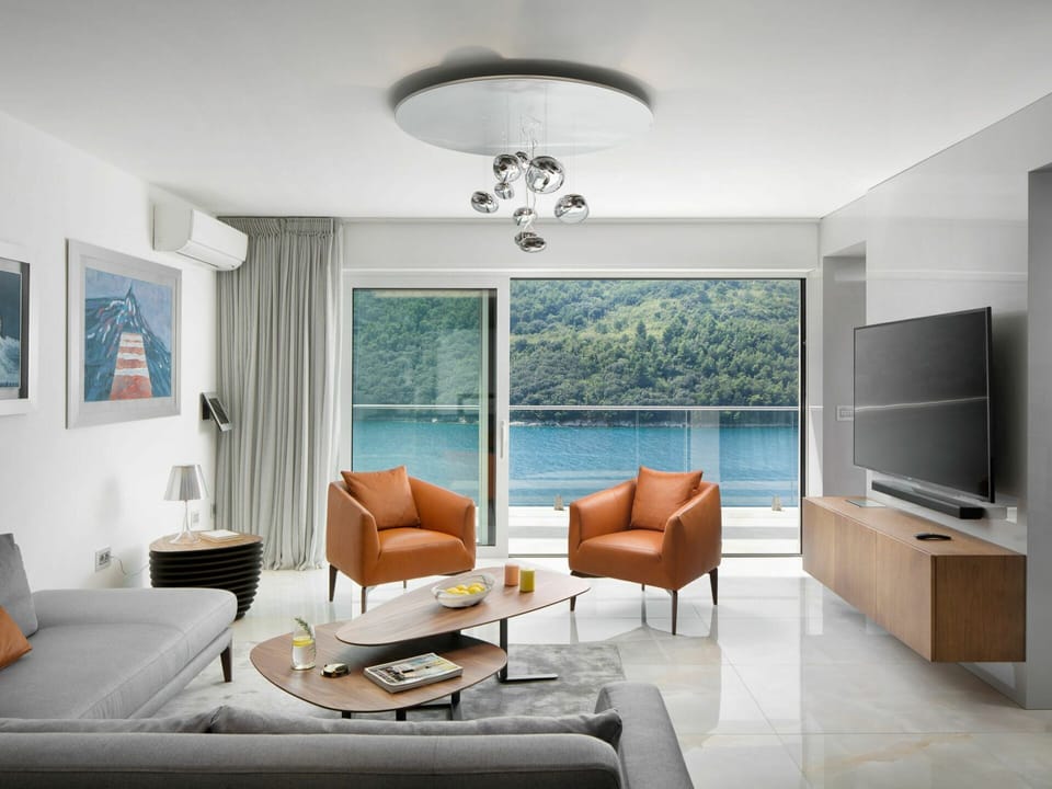 Property, Furniture, Couch, Table, Picture Frame, Comfort, Azure, Wood, Building, Lighting