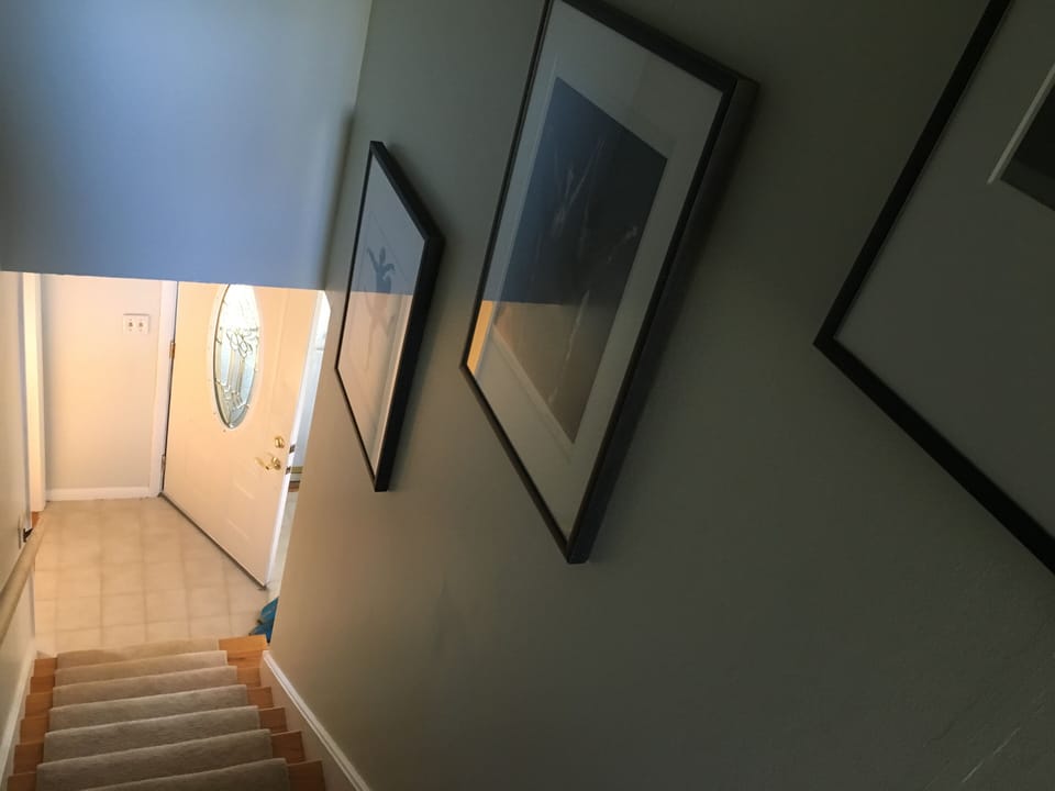 Entrance with stairs leading upstairs 