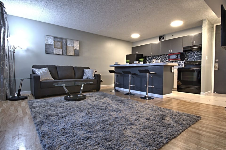 The living room and kitchen.