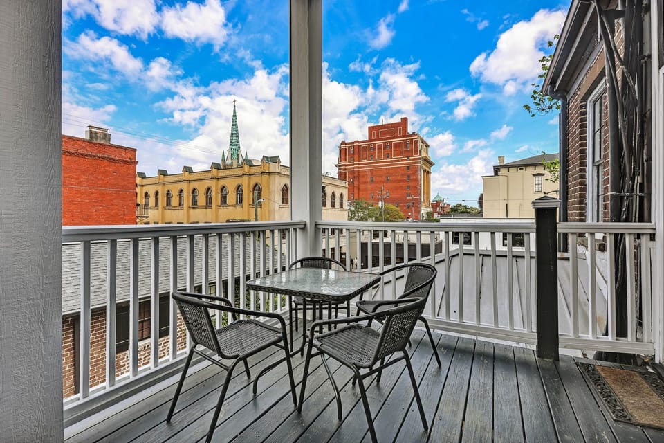 Deck off of dining room overlooking semi-private courtyard