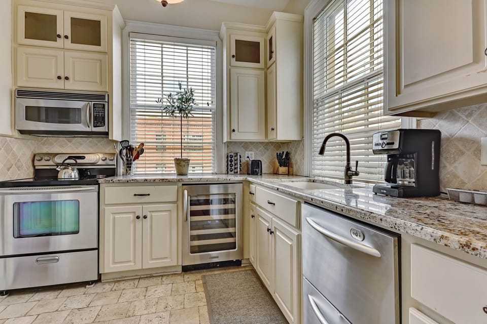 Kitchen with premium appliances and wine refrigerator