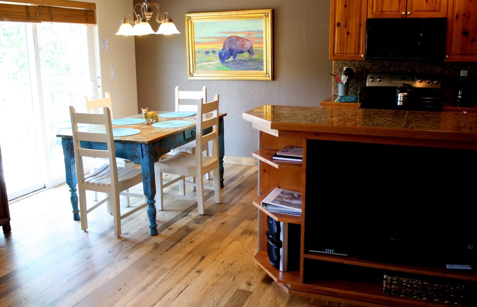 Antique dining table, new kitchen appliances, wide screen TV, stereo & CD player