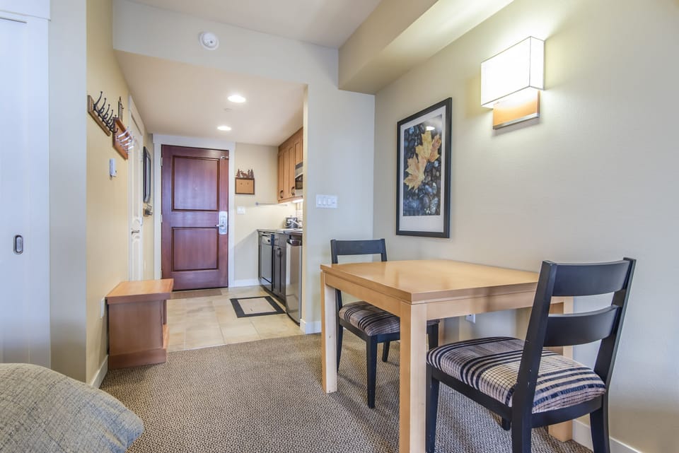 Dining Area - Quaint dining table with seating for two guests.