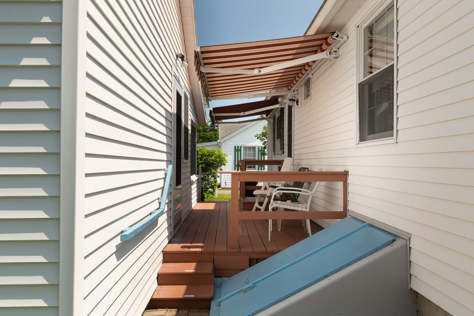 Deck between front cottage (on right) and rear cottage (on left).
