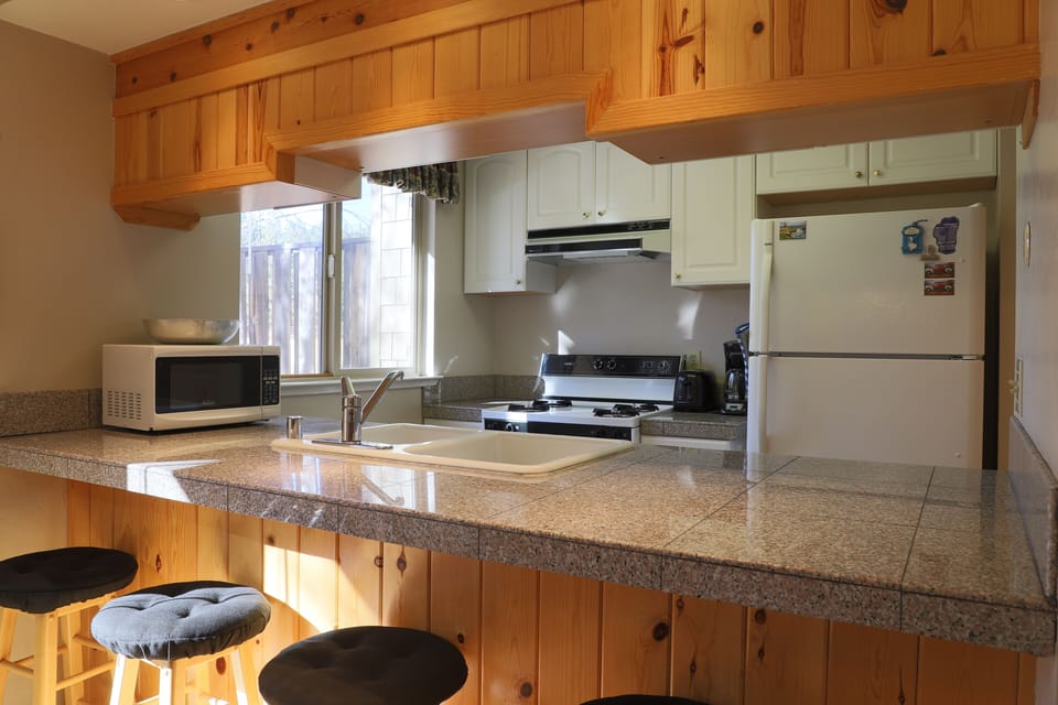 kitchen breakfast bar with seating for three