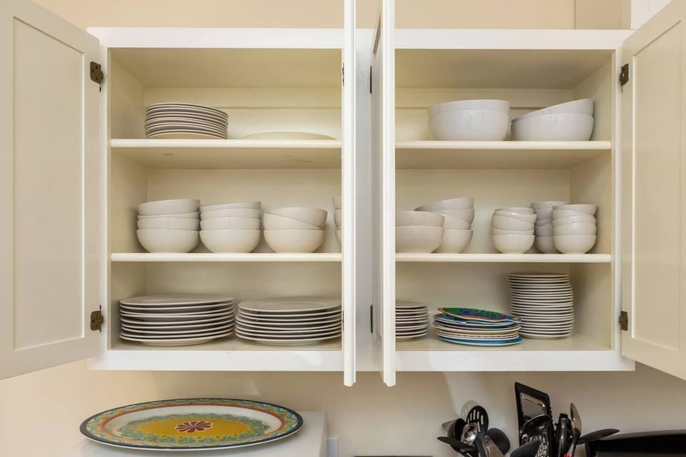 Cabinet full of dishes for every meal