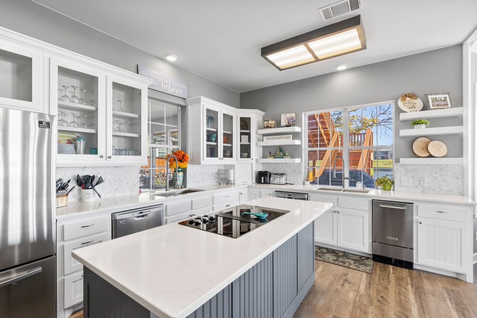 Gourmet kitchen with double ovens, microwave, coffee pot, air fryer, 5 burner stove, double sinks and double dishwashers!  