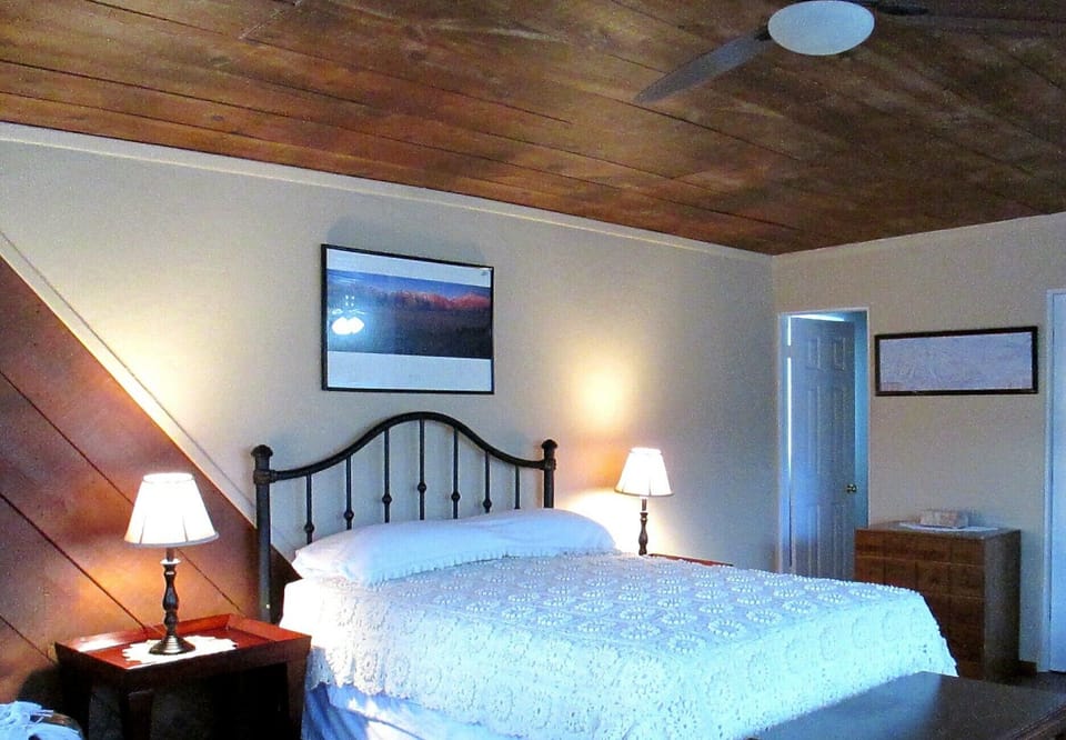 Queen size bed with new mattress and Egyptian cotton linen.  