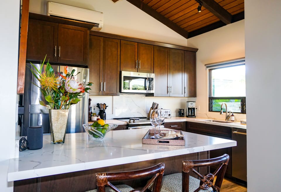 Kitchen is well stocked with everything you need for cooking a delicious meal.