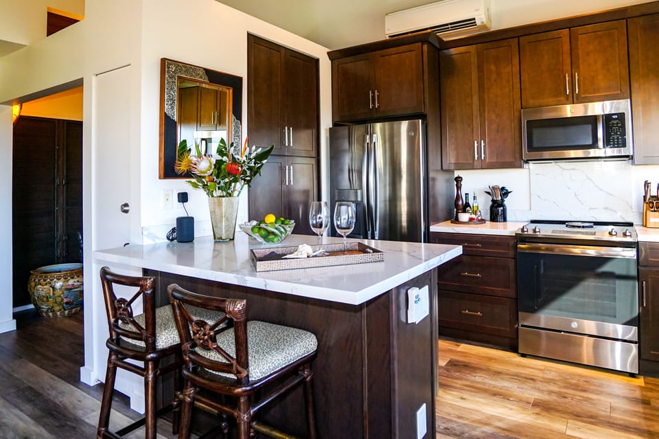 The renovated kitchen has great counter space and storage.